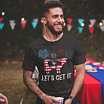 Happy Patriotic 4th July Fireworks Weed T-Shirt - Proud 4th July America USA Flag Let's Get It Cannabis Shirt-smiling-man-wearing-a-tshirt-mockup-at-a-4th-of-july-bbq