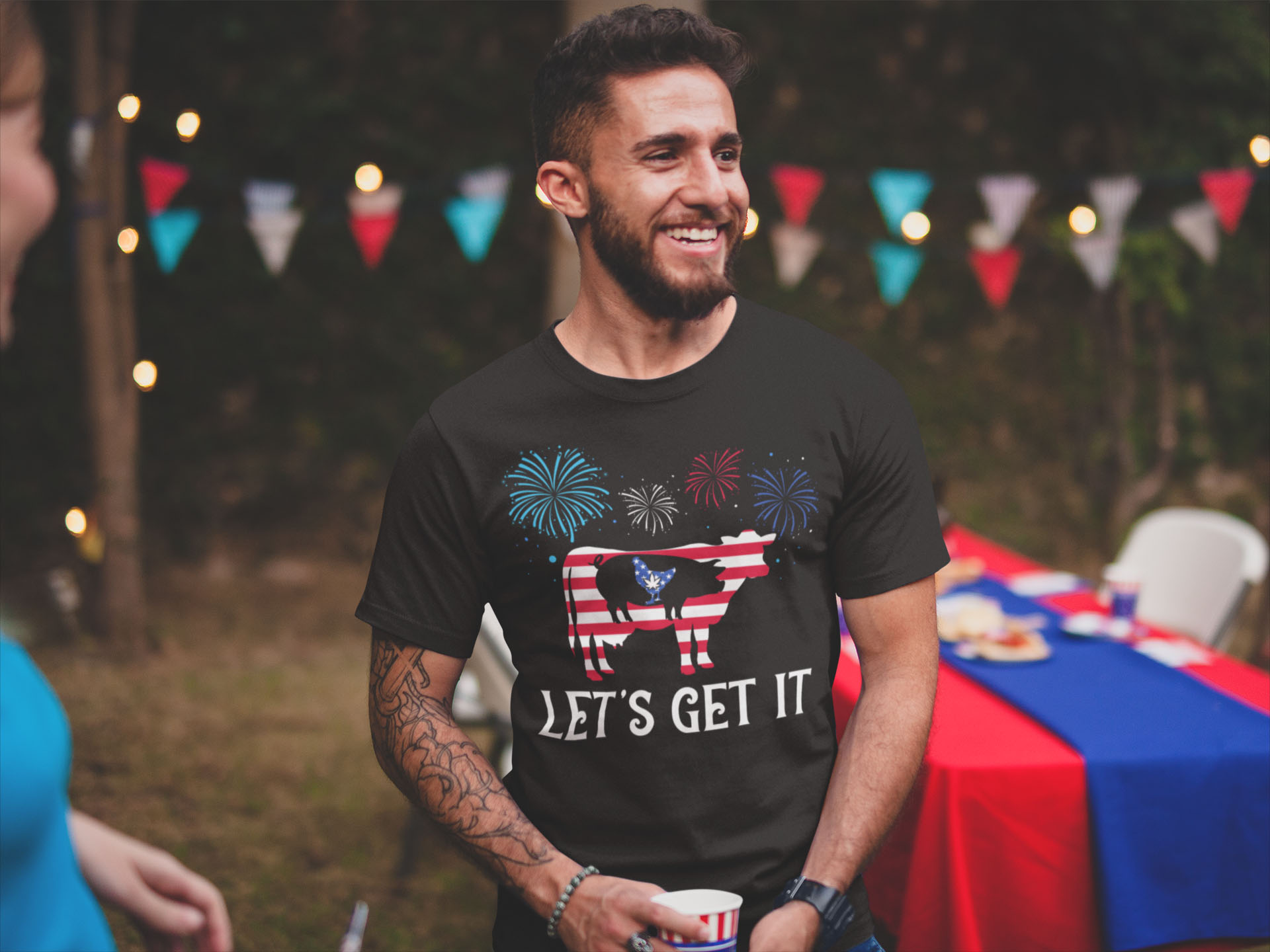 Happy Patriotic 4th July Fireworks Weed T-Shirt - Proud 4th July America USA Flag Let's Get It Cannabis Shirt-smiling-man-wearing-a-tshirt-mockup-at-a-4th-of-july-bbq