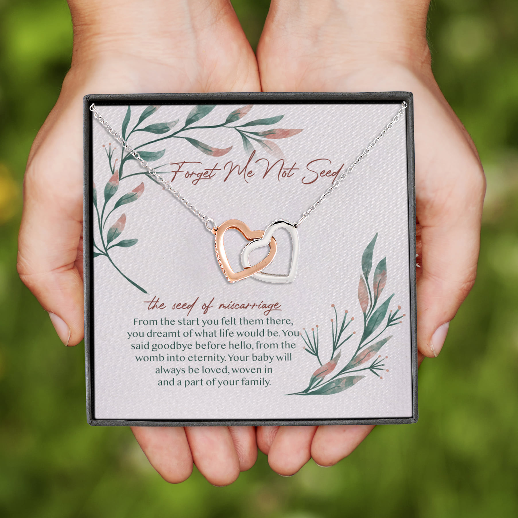 6HP. Forget Not Seed Interlocking Hearts Necklace