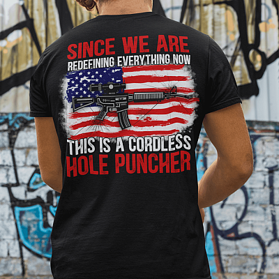 Alternative view of Since We Are Redefining Everything Now This Is A Cordless Hole Puncher Funny Gun American Flag Print On Back T-Shirt
