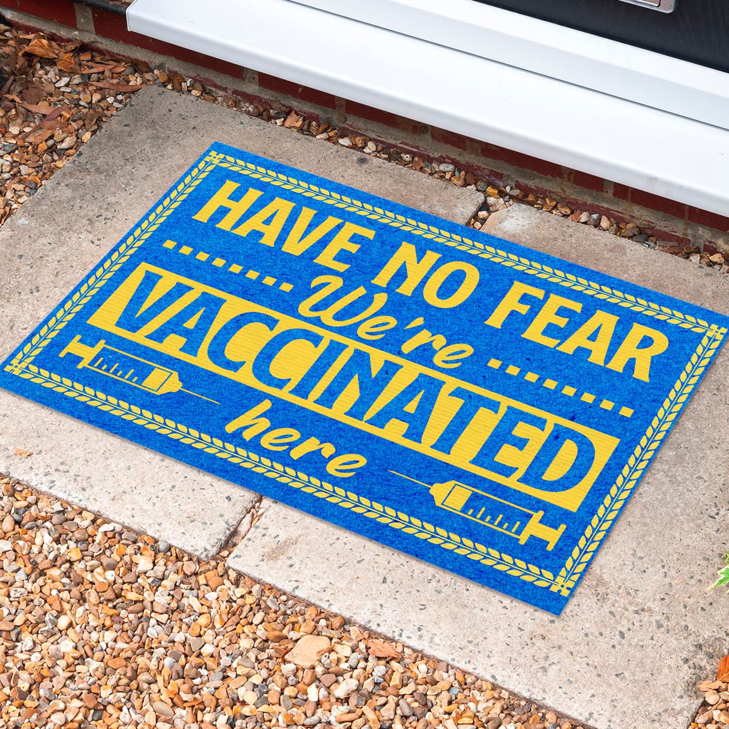2 HG. Vaccinated Here(2) Doormat Mockup 10