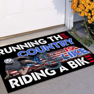 Alternative view of Running The Country Is Like Riding A Bike Funny Biden House Doormat - Biden Falling Off Bike Outdoor Doormat