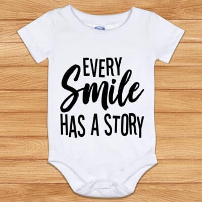 Every Smile Has A Story Baby Onesie Shirt - Awareness Motivational Quote Onesie
