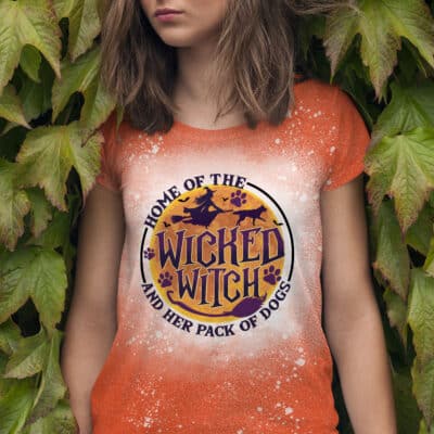 Home Of The Wicked Witch And Her Pack Of Dogs Funny Witch Halloween Bleached T-Shirt - Halloween Dog Lover Shirt
